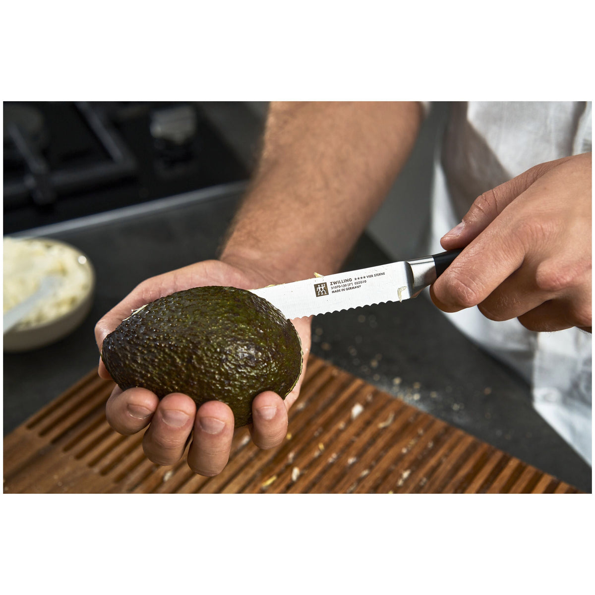 ZWILLING Four Star Utility knife 5 inch, serrated edge