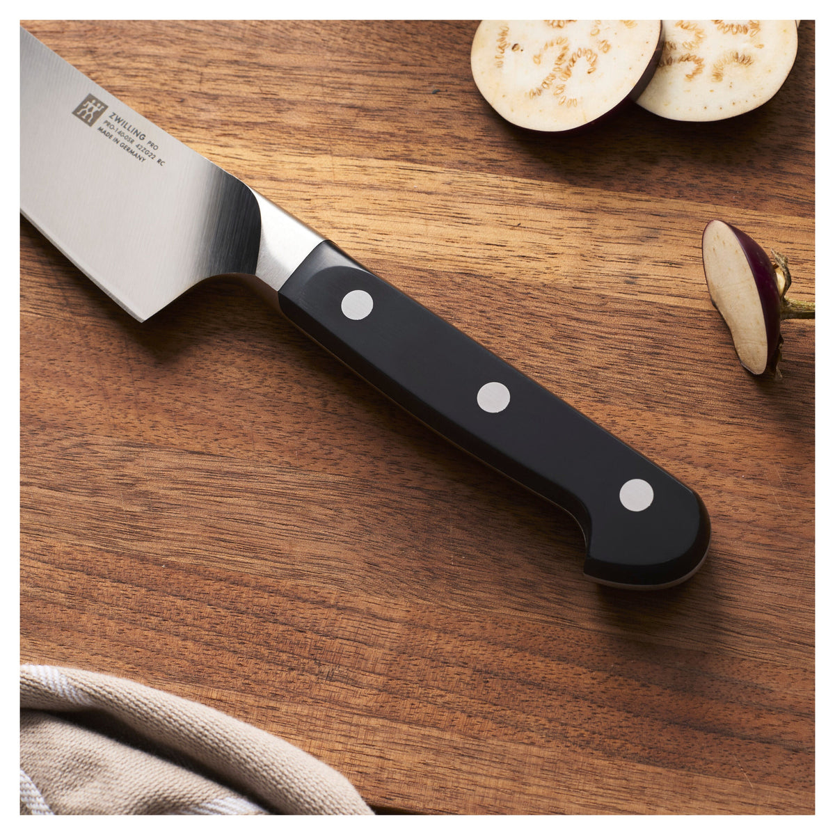 ZWILLING Pro 7-inch Rocking Santoku Knife, Hollow Edge