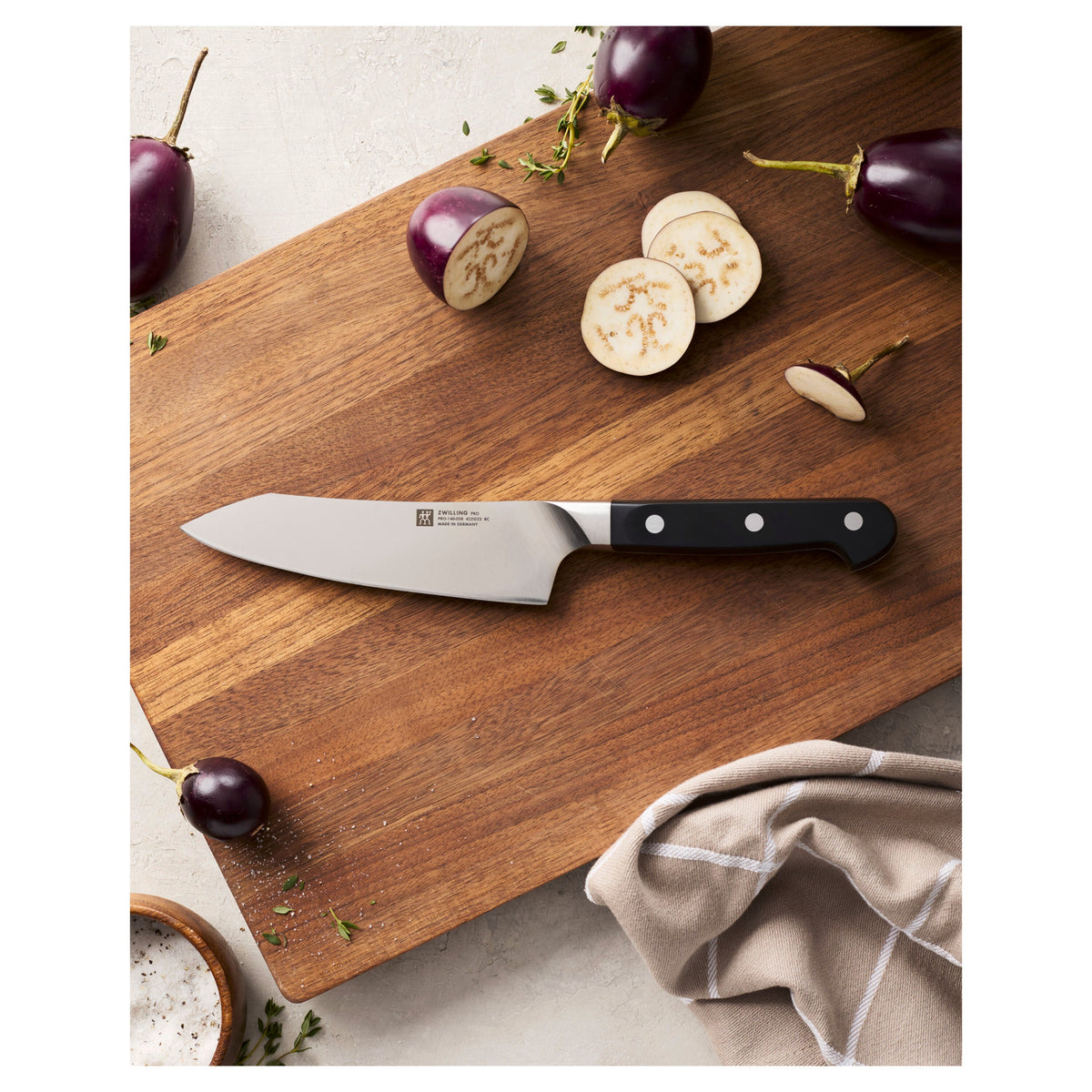 ZWILLING Pro 7-inch Rocking Santoku Knife, Hollow Edge