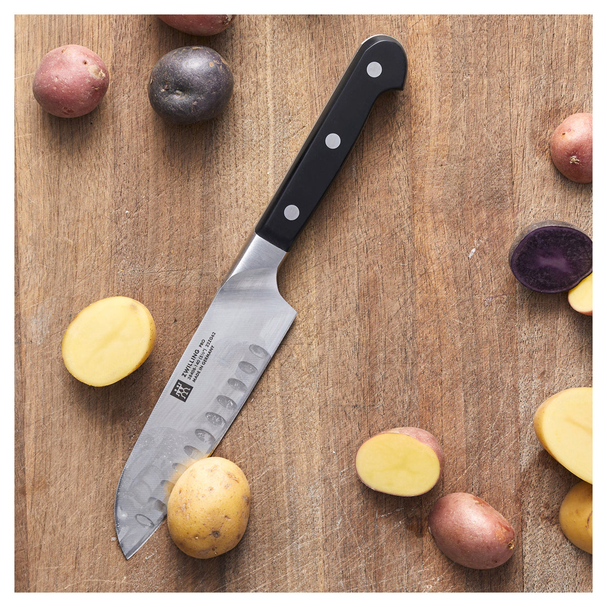 ZWILLING Pro 5.5-inch, Hollow Edge Santoku Knife