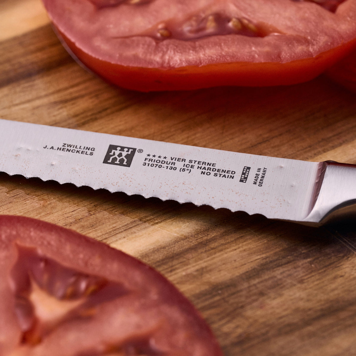 ZWILLING Four Star Utility knife 5 inch, serrated edge