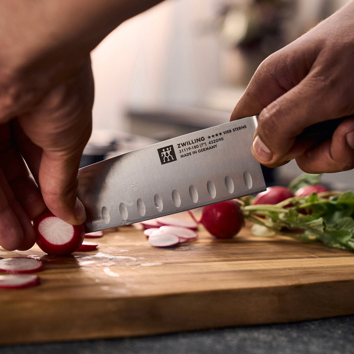 ZWILLING Four Star Santoku 7 inch, hollow edge