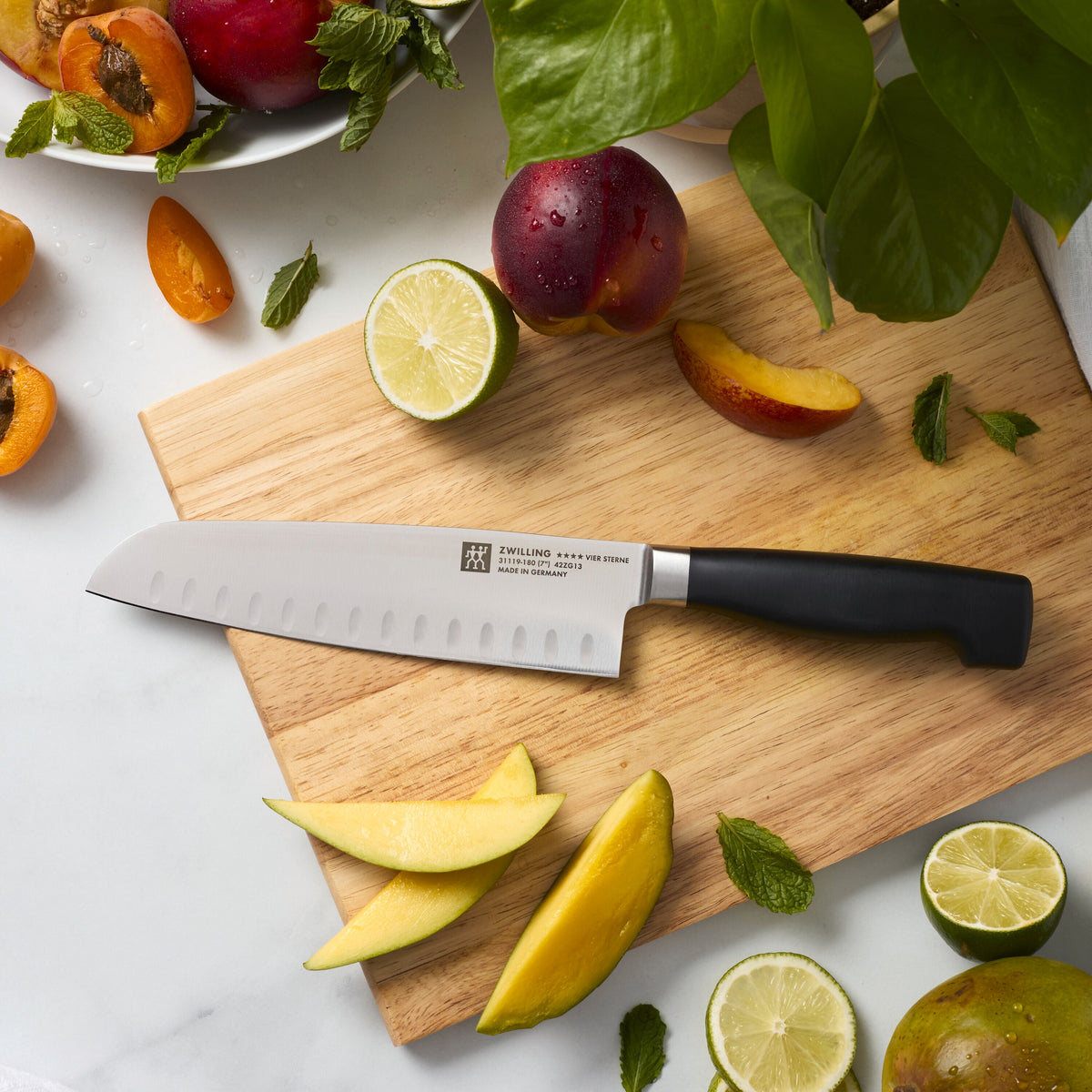 ZWILLING Four Star Santoku 7 inch, hollow edge